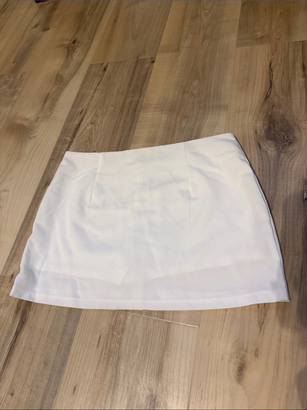 white size xs shen mini skirt with shorts under